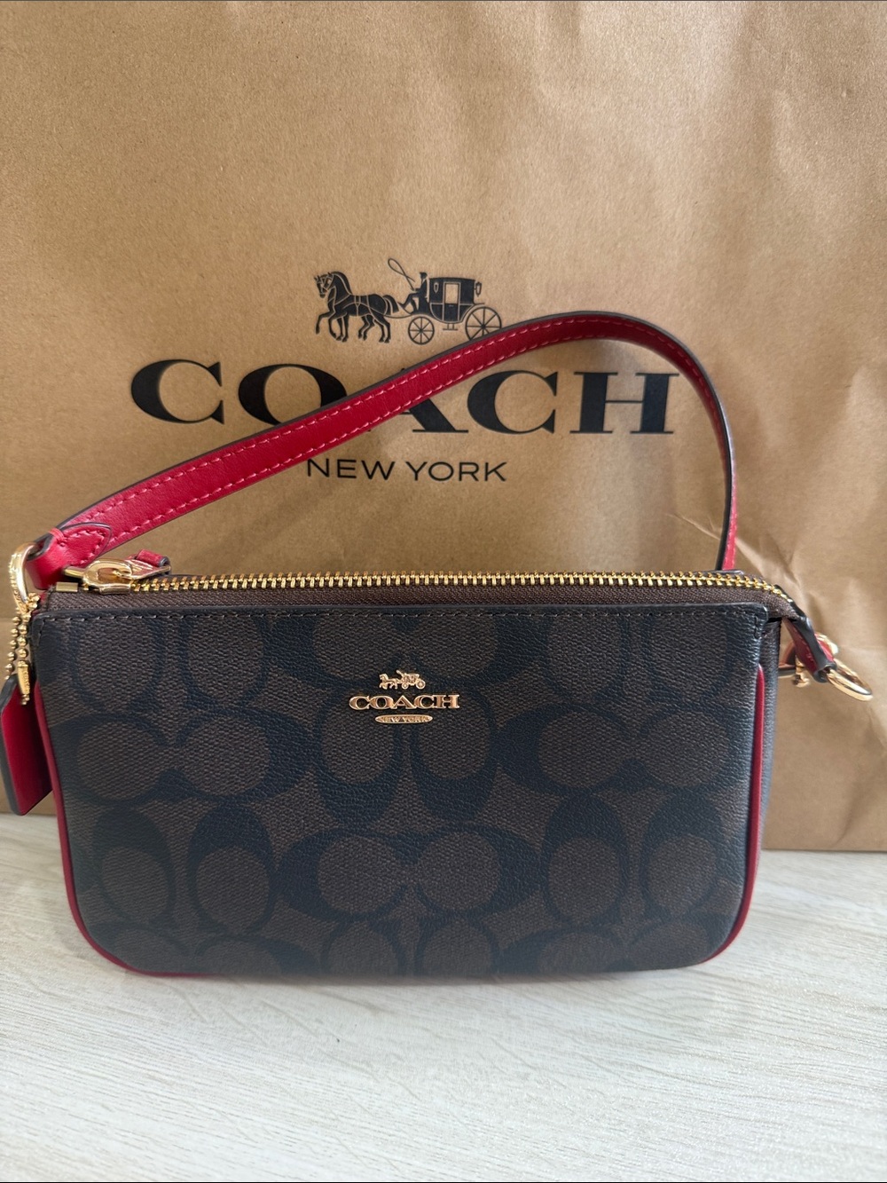 Coach Brown Signature Canvas Wristlet with Red Trim